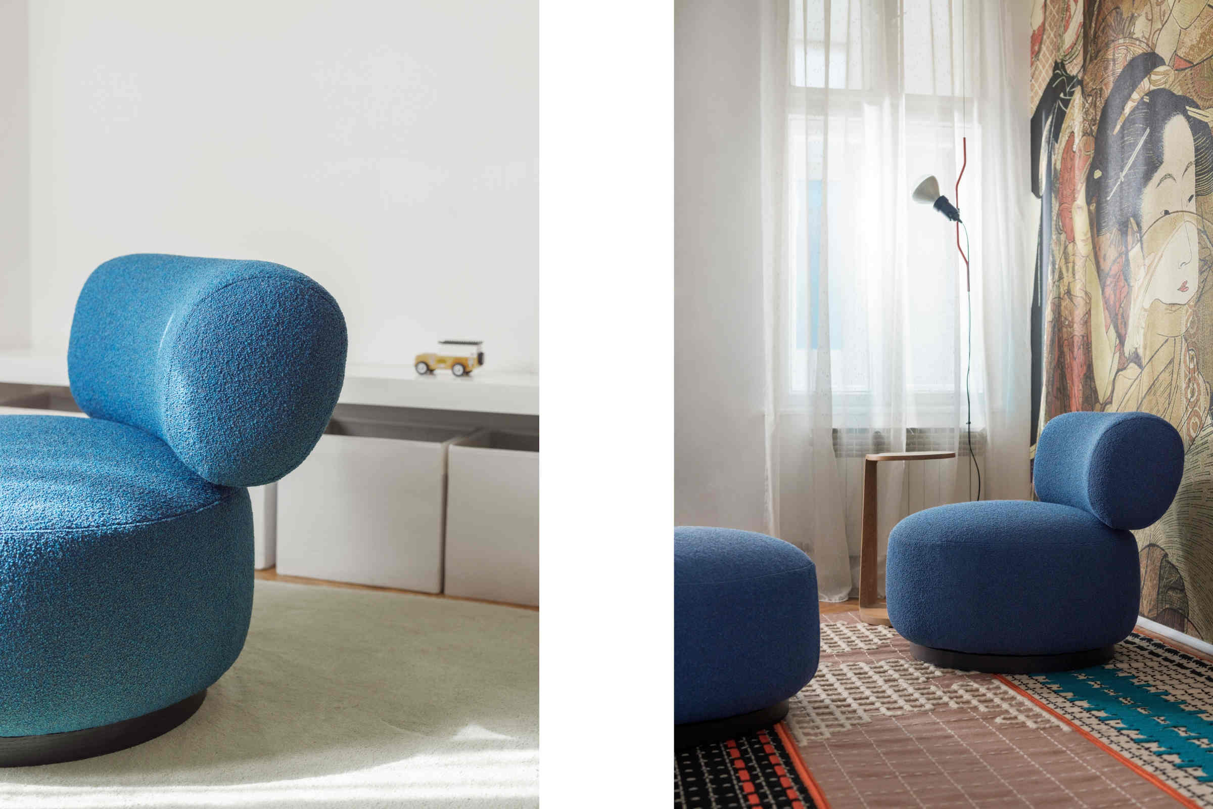 Sessel mit rundem Rücken und passendem Pouf vor asiatischer Wandkunst