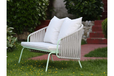 ATAMAN Designer Freizeit Gartensofa in Pastelltönen mit gemütlichen Kissen im Grünen