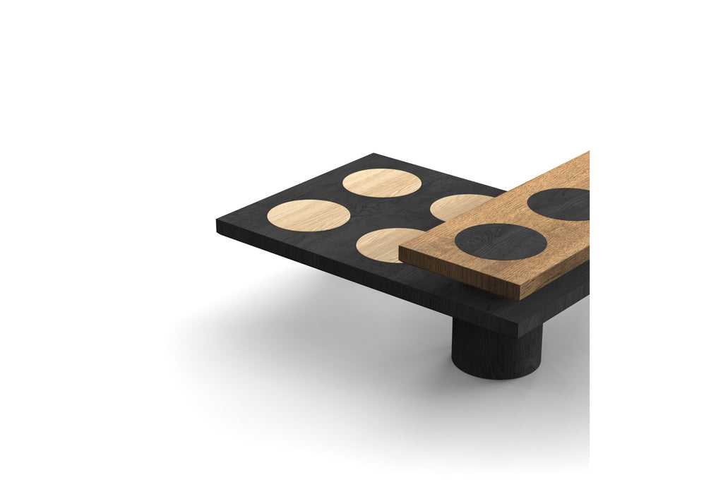 Nahaufnahme des Designer Couchtischs von Woak mit runden Holz-Einlagen