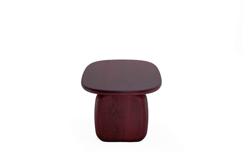 Frontansicht des CAIRN Designer Couchtisches mit ovaler Platte