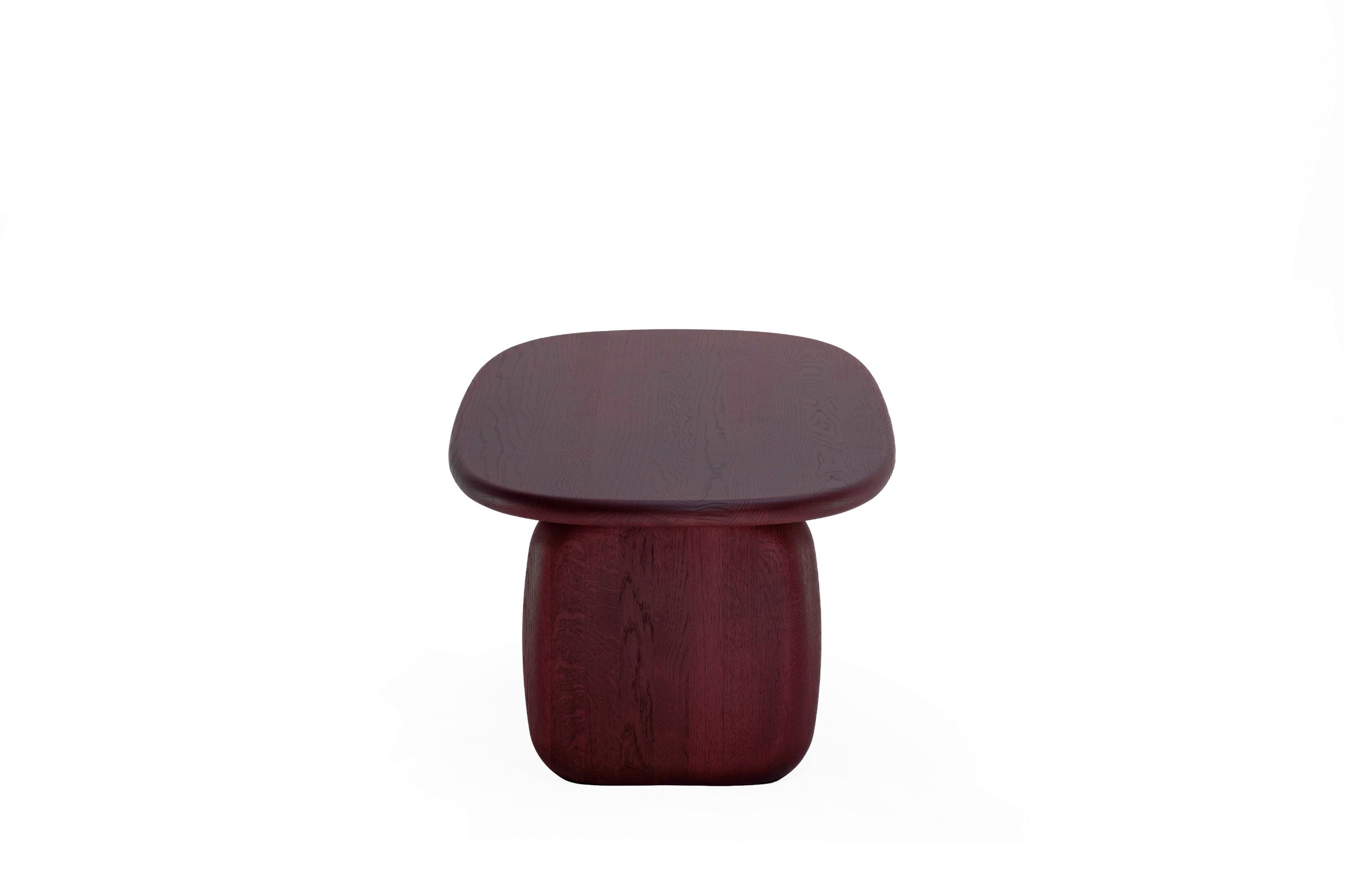 Frontansicht des CAIRN Designer Couchtisches mit ovaler Platte