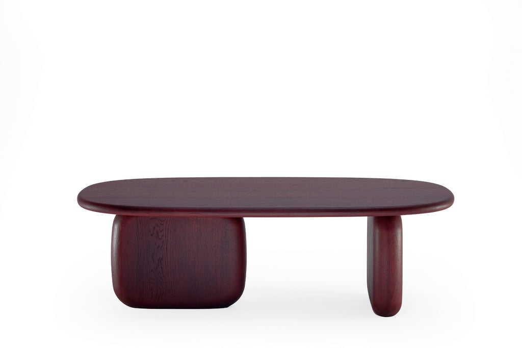 Seitenansicht des CAIRN Designer Couchtisches von Woak mit organischer Linienführung