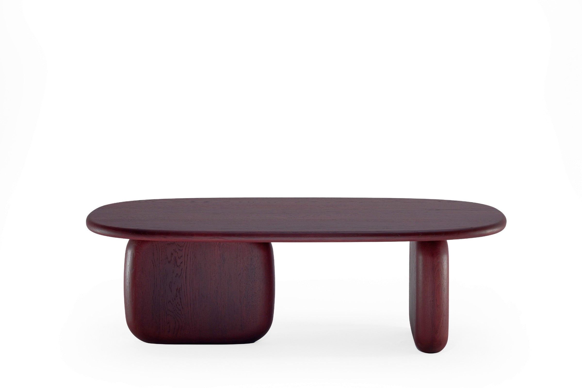 Seitenansicht des CAIRN Designer Couchtisches von Woak mit organischer Linienführung