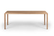 Vorderansicht des COLIN Massivholz Esstisches, der minimalistisches Design mit schlanker Tischplatte und schlichten Beinen zeigt