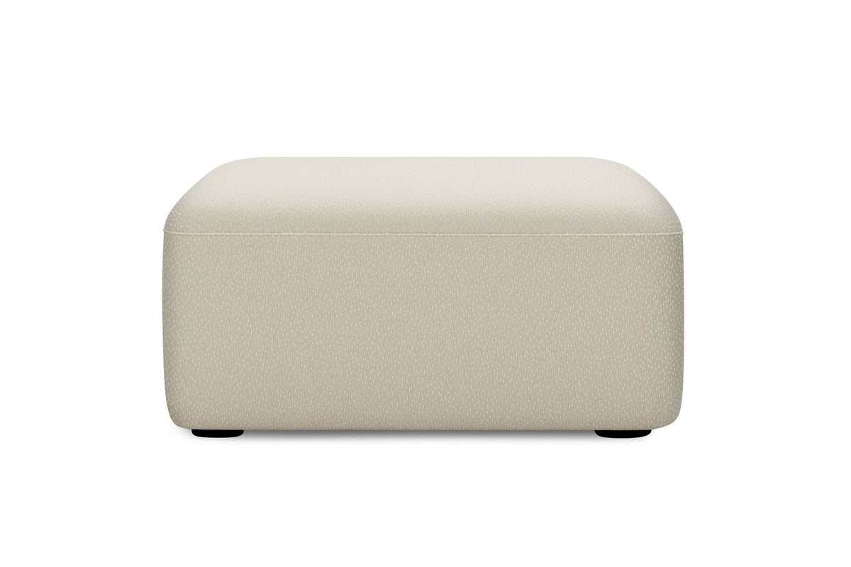 Designer Sofa Hocker in hellem Stoff mit abgerundeter Form