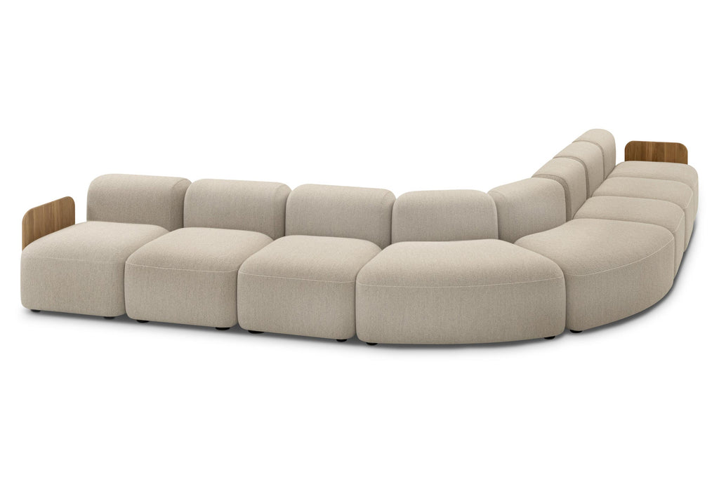 DOLMEN Designer Modular Sofa als große gebogene Sofalandschaft mit Holzdetails