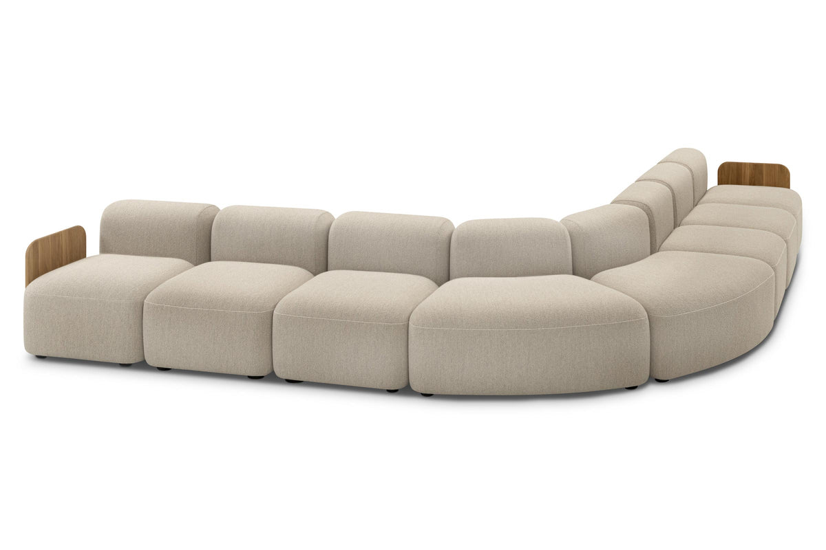 DOLMEN Designer Modular Sofa als große gebogene Sofalandschaft mit Holzdetails