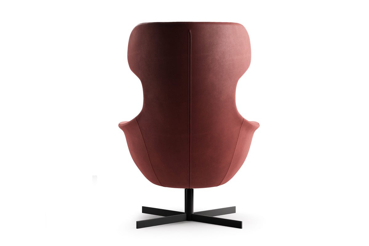 Designer Sessel in Rot von hinten mit schwarzem Kreuzfuß