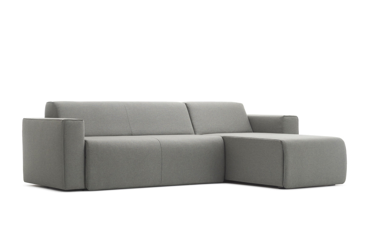 Mit Chaiselongue von EXTRAFORM in grauem Stoff in schräger Ansicht