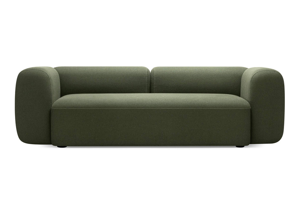 MONOLITE Designer Sofa in Dunkelgrün mit breiten Armlehnen und weicher Sitzfläche