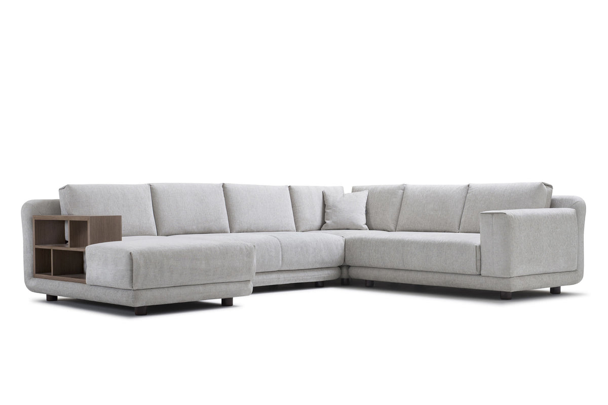 Sofa als modulare Wohnlandschaft mit Holzablage und großzügigen Sitzflächen