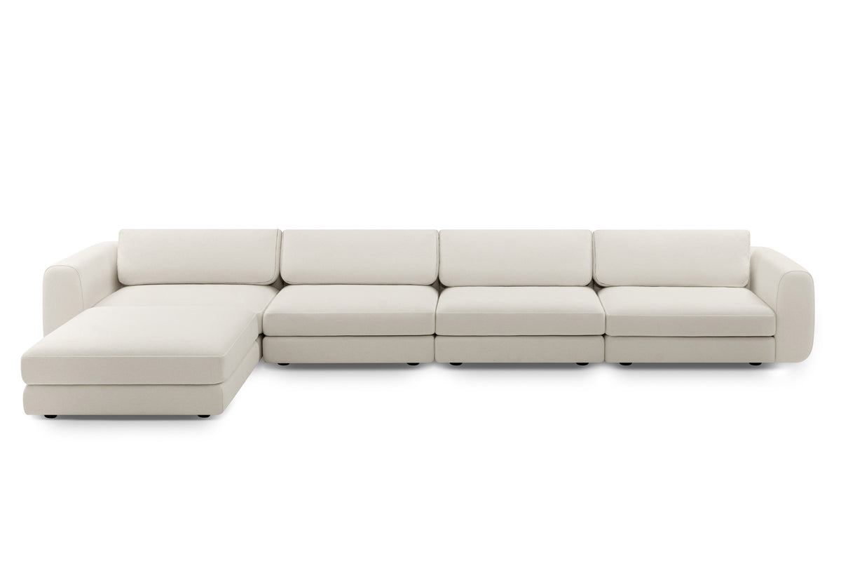 TRIBECA Designer Modular Sofa von Volumen als große Ecklandschaft mit passendem Pouf