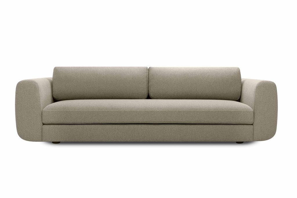 Sofa von Volumen als kompakter Zweisitzer mit breiten Armlehnen
