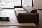XOLA Designer 2-Sitzer Sofa von EXTRAFORM in modernem Wohnraum mit großen Fenstern