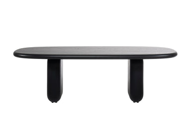 CAIRN Designer Esstisch in schwarzem Massivholz, Ansicht von vorne mit abgerundeten Kanten und breiten Beinen